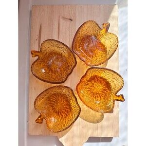 Apple-shaped color bowls in heavy Italian amber vintage glass 1970’s